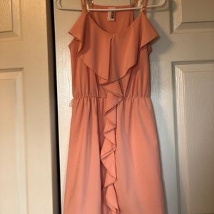 Peach colored ruffled dress